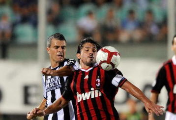 SIENA, ITALY - AUGUST 22:  Gennaro Gattuso of AC Milan (R) holds off Michele Fini of Siena during the Serie A match between Siena and AC Milan at Artemio Franchi - Montepaschi Arena Stadium on August 22, 2009 in Siena, Italy.  (Photo by Claudio Villa/Getty Images)