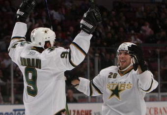 NEW YORK - OCTOBER 20:  Mike Modano #9 and Mark Fistric #28 of the Dallas Stars celebrate Modano's game-winning goal at 8:03 of the third period against the New York Rangers on October 20, 2008 at Madison Square Garden in New York City. The Stars defeated the Rangers 2-1. (Photo by Bruce Bennett/Getty Images)