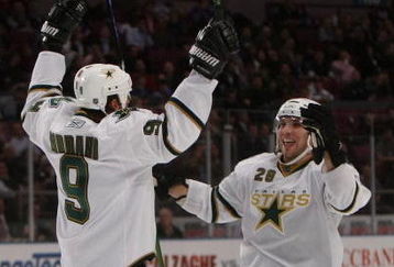 NEW YORK - OCTOBER 20:  Mike Modano #9 and Mark Fistric #28 of the Dallas Stars celebrate Modano's game-winning goal at 8:03 of the third period against the New York Rangers on October 20, 2008 at Madison Square Garden in New York City. The Stars defeated the Rangers 2-1. (Photo by Bruce Bennett/Getty Images)