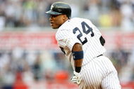 NEW YORK - AUGUST 12:  Robinson Cano #24 of the New York Yankees celebrates after hitting the game winning single against the Toronto Blue Jays during the MLB game on August 12, 2009 at Yankee Stadium in the Bronx borough of New York City.  The Yankees won 4-3 in 11 innings. (Photo by Nick Laham/Getty Images)