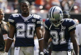 CLEVELAND - SEPTEMBER 7:  Alan Ball #20 and Mike Jenkins #31 of the Dallas Cowboys look on before the game against the Cleveland Browns at Cleveland Browns Stadium on September 7, 2008 in Cleveland, Ohio.  (Photo by Kevin C. Cox/Getty Images)
