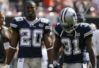 CLEVELAND - SEPTEMBER 7:  Alan Ball #20 and Mike Jenkins #31 of the Dallas Cowboys look on before the game against the Cleveland Browns at Cleveland Browns Stadium on September 7, 2008 in Cleveland, Ohio.  (Photo by Kevin C. Cox/Getty Images)