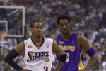 10 Jun 2001:  Allen Iverson #3 of the Philadelphia 76ers stands with Kobe Bryant #8 of the Los Angeles Lakers during game 3 of the NBA Finals at the First Union Center in Philadelphia, Pennsylvania.  DIGITAL IMAGE Mandatory Credit: Ezra Shaw/ALLSPORT. NOTE TO USER: It is expressly understood that the only rights Allsport are offering to license in this Photograph are one-time, non-exclusive editorial rights. No advertising or commercial uses of any kind may be made of Allsport photos.  User acknowledges that it is aware that Allsport is an editorial sports agency and that NO RELEASES OF ANY TYPE ARE OBTAINED from the subjects contained in the photographs.