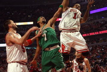 CHICAGO - APRIL 26: Derrick Rose #1 of the Chicago Bulls leaps to grab a rebound away from Mikki Moore #7 of the Boston Celtics in Game Four of the Eastern Conference Quarterfinals during the 2009 NBA Playoffs at the United Center on April 26, 2009 in Chicago, Illinois. NOTE TO USER: User expressly acknowledges and agreees that, by downloading and/or using this Photograph, User is consenting to the terms and conditions of the Getty Images License Agreement. (Photo by Jonathan Daniel/Getty Images)