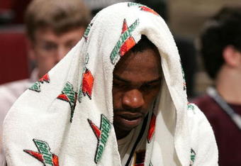 CHICAGO - MARCH 09:  Tyler Smith #34 of the Iowa Hawkeyes hangs his head on the bench in the final minutes of their the Purdue Boilermakers during the quarterfinals of the Big Ten Men's Basketball Conference Tournament March 9, 2007 at the United Center in Chicago, Illinois. Purdue won 74-55. (Photo by Jonathan Daniel/Getty Images)