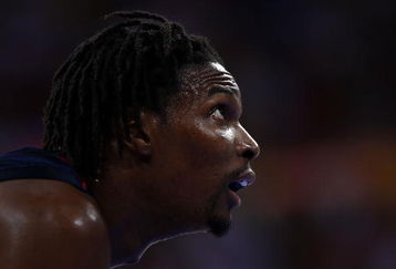 BEIJING - AUGUST 12:  Chris Bosh #12 of the United States looks on while taking on Angola during the men's preliminary round basketball game at the Beijing Olympic Basketball Gymnasium during Day 4 of the Beijing 2008 Olympic Games on August 12, 2008 in Beijing, China.  (Photo by Mike Hewitt/Getty Images)