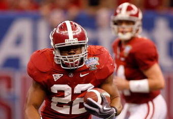 NEW ORLEANS - JANUARY 02:  Running back Mark Ingram #22 of the Alabama Crimson Tide rushes the ball for 13-yards and a first down in the second quarter against the Utah Utes during the 75th Allstate Sugar Bowl at the Louisiana Superdome on January 2, 2009 in New Orleans, Louisiana.  (Photo by Chris Graythen/Getty Images)