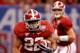NEW ORLEANS - JANUARY 02:  Running back Mark Ingram #22 of the Alabama Crimson Tide rushes the ball for 13-yards and a first down in the second quarter against the Utah Utes during the 75th Allstate Sugar Bowl at the Louisiana Superdome on January 2, 2009 in New Orleans, Louisiana.  (Photo by Chris Graythen/Getty Images)