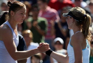 NEW YORK - SEPTEMBER 01:  Dinara Safina (L) of Russia shakes hands with Olivia Rogowska of Australia after Rogowska was defeated during day two of the 2009 U.S. Open at the USTA Billie Jean King National Tennis Center on September 1, 2009 in Flushing neighborhood of the Queens borough of New York City.  (Photo by Jim McIsaac/Getty Images)