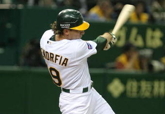 TOKYO - MARCH 26:  Outfielder Chris Denorfia #19 of Oakland Athletics bats during MLB Opening Series between Boston Red Sox and Oakland Athletics at Tokyo Dome on March 26, 2008 in Tokyo, Japan.  (Photo by Koichi Kamoshida/Getty Images)