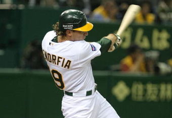 TOKYO - MARCH 26:  Outfielder Chris Denorfia #19 of Oakland Athletics bats during MLB Opening Series between Boston Red Sox and Oakland Athletics at Tokyo Dome on March 26, 2008 in Tokyo, Japan.  (Photo by Koichi Kamoshida/Getty Images)