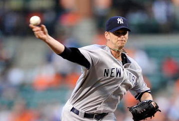 BALTIMORE - SEPTEMBER 01:  A.J. Burnett #34 of the New York Yankees pitches against the Baltimore Orioles at Camden Yards on September 1, 2009 in Baltimore, Maryland.  (Photo by Greg Fiume/Getty Images)