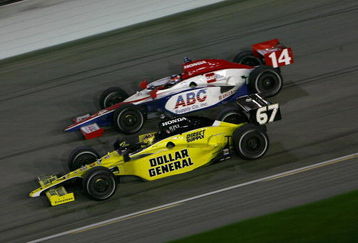 JOLIET, IL - AUGUST 29: Sarah Fisher drives the #67 Dollar General Sarah Fisher Racing Dallara Honda inside Ryan Hunter-Reay in the ABC Supply Co AJ Foyt Racing Dallara Honda during the IRL IndyCar Series PEAK Antifreeze & Motor Oil Indy 300 on August 29, 2009 at the Chicagoland Speedway in Joliet, Illinois  (Photo by Darrell Ingham/Getty Images)