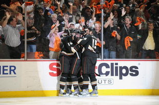 ANAHEIM, CA - MAY 07:  (L) Corey Perry #10 of the Anaheim Ducks celebrates his goal with teammates (C) Bobby Ryan #9 and (R) Ryan Getzlaf #15 in Game Four of the Western Conference Semifinals against the Detroit Red Wings at Honda Center on May 7, 2009 in Anaheim, California.  The Red Wings won 6-3.  (Photo by Harry How/Getty Images)