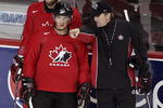 CALGARY, CANADA - AUGUST 24: Head Coach Mike Babcock points out something to Sidney Crosby during the second practice of the Team Canada Olympic Orientation Camp on August 24, 2009 at the Pengrowth Saddledome in Calgary, Alberta, Canada. Rick Nash is behind Crosby.(Photo by Mike Ridewood/Getty Images)