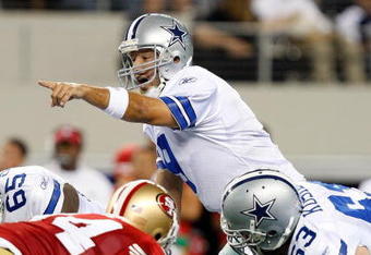 ARLINGTON, TX - AUGUST 29:  Quarterback Tony Romo #9 of the Dallas Cowboys at Cowboys Stadium on August 29, 2009 in Arlington, Texas.  (Photo by Ronald Martinez/Getty Images)