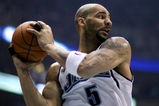 SALT LAKE CITY - APRIL 25:  Carlos Boozer #5 of the Utah Jazz comes down with a rebound in Game Four of the Western Conference Quarterfinals against the Los Angeles Lakers during the 2009 NBA Playoffs at Energy Solutions Arena on April 25, 2009 in Salt Lake City, Utah.  The Lakers won 108-94.  NOTE TO USER: User expressly acknowledges and agrees that, by downloading and/or using this Photograph, user is consenting to the terms and conditions of the Getty Images License Agreement.  (Photo by Otto Greule Jr/Getty Images)  