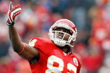 KANSAS CITY, MO - DECEMBER 14:  Dwayne Bowe #82 of the Kansas City Chiefs reacts to video replay of a Tony Gonzalez touchdown against the San Diego Chargers of during the first quarter on December 14, 2008 at Arrowhead Stadium in Kansas City, Missouri.  (Photo by Harry How/Getty Images)