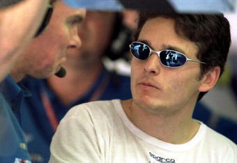 17 Mar 2001:  Giancarlo Fisichella of Italy and the Benetton Renault Formula One Team in the pit during qualifying at the Sepang International Circuit, in preperation for the Malaysian Grand Prix, which is round 2 of the FIA Formula One World Championships, Kuala Lumpur, Malaysia.  Mandatory Credit: Mark Thompson/ALLSPORT