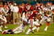 MIAMI - JANUARY 08:  Mossis Madu #17 of the Oklahoma Sooners gets tackled by Jermaine Cunningham #49 of the Florida Gators during the FedEx BCS National Championship Game at Dolphin Stadium on January 8, 2009 in Miami, Florida.  (Photo by Eliot J. Schechter/Getty Images)