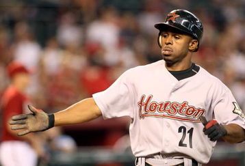 PHOENIX - JUNE 14:  Michael Bourn #21 of the Houston Astros scores a run against the Arizona Diamondbacks during the major league baseball game at Chase Field on June 14, 2009 in Phoenix, Arizona.   The Astros defeated the Diamondbacks 8-3.  (Photo by Christian Petersen/Getty Images)