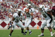 COLLEGE STATION, TX - SEPTEMBER 11:  Corey Bramlet #17 of the Wyoming Cowboys looks to pass during the game against the Texas A&M Aggies on September 11, 2004 at Kyle Field in College Station, Texas. (Photo by Ronald Martinez/Getty Images) 