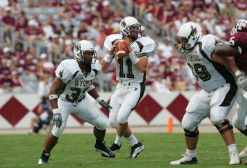 COLLEGE STATION, TX - SEPTEMBER 11:  Corey Bramlet #17 of the Wyoming Cowboys looks to pass during the game against the Texas A&M Aggies on September 11, 2004 at Kyle Field in College Station, Texas. (Photo by Ronald Martinez/Getty Images) 