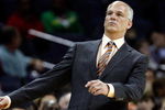CHARLOTTE, NC - MARCH 16:  Head coach Jay Triano of the Toronto Raptors watches his team in action against the Charlotte Bobcats during their game at Time Warner Cable Arena on March 16, 2009 in Charlotte, North Carolina.  NOTE TO USER: User expressly acknowledges and agrees that, by downloading and/or using this Photograph, user is consenting to the terms and conditions of the Getty Images License Agreement.  (Photo by Streeter Lecka/Getty Images)