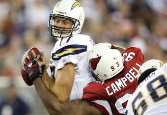 GLENDALE, AZ - AUGUST 22:  Quarterback Philip Rivers #17 of the San Diego Chargers is sacked by Calais Campbell #93 of the Arizona Cardinals during the NFL game at the University of Phoenix Stadium on August 22, 2009 in Glendale, Arizona. The Chargers defeated the Cardinals 17-6.  (Photo by Christian Petersen/Getty Images)