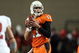 STILLWATER, OK - NOVEMBER 29:  Quarterback Zac Robinson #11 of the Oklahoma State Cowboys drops back to pass against the Oklahoma Sooners at Boone Pickens Stadium on November 29, 2008 in Stillwater, Oklahoma.  (Photo by Ronald Martinez/Getty Images)