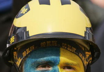 ANN ARBOR, MI - NOVEMBER 4:  A fan wears the school colors during the NCAA football game between the Ball State Cardinals and the Michigan Wolverines on November 4, 2006 at Michigan Stadium in Ann Arbor, Michigan. Michigan won 34-26. (Photo by Brian Bahr/Getty Images)