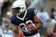 STATE COLLEGE, PA - SEPTEMBER 06:  Tailback Evan Royster #22 of the Penn State Nittany Lions runs the ball against the Oregon State Beavers at Beaver Stadium on September 6, 2008 in State College, Pennsylvania.  (Photo by Ronald Martinez/Getty Images)
