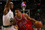 BOSTON - MAY 02:  Derrick Rose #1 of the Chicago Bulls drives to the net as Rajon Rondo #9 of the Boston Celtics defends in Game Seven of the Eastern Conference Quarterfinals during the 2009 NBA Playoffs at TD Banknorth Garden on May 2, 2009 in Boston, Massachusetts. The Celtics defeated the Bulls 109-99. NOTE TO USER: User expressly acknowledges and agrees that, by downloading and or using this photograph, User is consenting to the terms and conditions of the Getty Images License Agreement.  (Photo by Elsa/Getty Images)