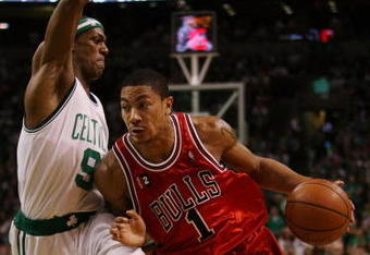 BOSTON - MAY 02:  Derrick Rose #1 of the Chicago Bulls drives to the net as Rajon Rondo #9 of the Boston Celtics defends in Game Seven of the Eastern Conference Quarterfinals during the 2009 NBA Playoffs at TD Banknorth Garden on May 2, 2009 in Boston, Massachusetts. The Celtics defeated the Bulls 109-99. NOTE TO USER: User expressly acknowledges and agrees that, by downloading and or using this photograph, User is consenting to the terms and conditions of the Getty Images License Agreement.  (Photo by Elsa/Getty Images)