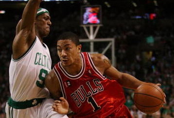 BOSTON - MAY 02:  Derrick Rose #1 of the Chicago Bulls drives to the net as Rajon Rondo #9 of the Boston Celtics defends in Game Seven of the Eastern Conference Quarterfinals during the 2009 NBA Playoffs at TD Banknorth Garden on May 2, 2009 in Boston, Massachusetts. The Celtics defeated the Bulls 109-99. NOTE TO USER: User expressly acknowledges and agrees that, by downloading and or using this photograph, User is consenting to the terms and conditions of the Getty Images License Agreement.  (Photo by Elsa/Getty Images)