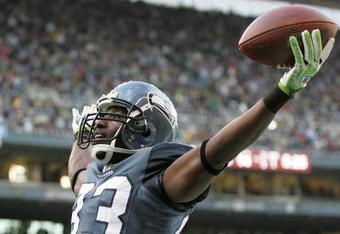 SEATTLE - DECEMBER 07:  Wide receiver Deion Branch  #83 of the Seattle Seahawks celebrates after scoring a touchdown against the New England Patriots on December 7, 2008 at Qwest Field in Seattle, Washington. (Photo by Otto Greule Jr/Getty Images)