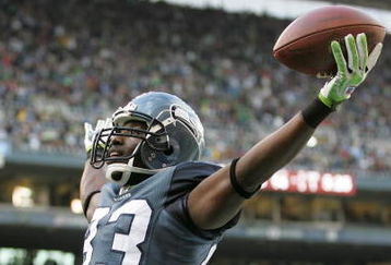 SEATTLE - DECEMBER 07:  Wide receiver Deion Branch  #83 of the Seattle Seahawks celebrates after scoring a touchdown against the New England Patriots on December 7, 2008 at Qwest Field in Seattle, Washington. (Photo by Otto Greule Jr/Getty Images)