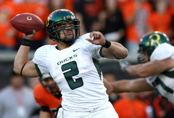 CORVALLIS, OR - NOVEMBER 29: Quarterback Jeremiah Masoli #2  of the Oregon Ducks throws a pass against the Oregon State Beavers at Reser Stadium on November 29, 2008 in Corvalis, Oregon.  (Photo by Jonathan Ferrey/Getty Images)