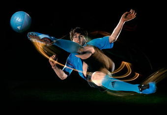 UNDATED - UNSPECIFIED:   Lionel Messi of Barcelona and Argentina in his new adidas F50i football boots and training kit.  (Photo by Getty Images for adidas)