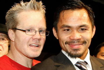 LAS VEGAS - DECEMBER 06:  Manny Pacquiao (R) of the Philippines and his trainer Freddie Roach appear at a news conference following Pacquiao's victory over Oscar De La Hoya in their welterweight bout at the MGM Grand Garden Arena December 6, 2008 in Las Vegas, Nevada.  (Photo by Ethan Miller/Getty Images)