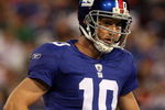 EAST RUTHERFORD, NJ - AUGUST 29:  Eli Manning #10 of the New York Giants looks on against the New York Jets on August 29, 2009 at Giants Stadium in East Rutherford, New Jersey.  (Photo by Jim McIsaac/Getty Images)