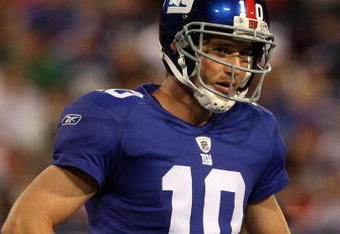 EAST RUTHERFORD, NJ - AUGUST 29:  Eli Manning #10 of the New York Giants looks on against the New York Jets on August 29, 2009 at Giants Stadium in East Rutherford, New Jersey.  (Photo by Jim McIsaac/Getty Images)