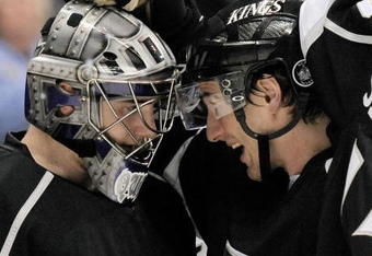 LOS ANGELES, CA - APRIL 11:  Peter Harrold #5 (R) defensman of the Los Angeles Kings congratulates goalie Jonathan Quick #32 after defeating the San Jose Sharks, 4-3, on April 11, 2009 on April 11, 2009 at the Staples Center in Los Angeles, California.  (Photo by Kevork Djansezian/Getty Images)