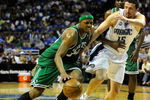 ORLANDO, FL - MAY 14:  Paul Pierce #34 of the Boston Celtics drives past Hedo Turkoglu #15 of the Orlando Magic in Game Six of the Eastern Conference Semifinals during the 2009 NBA Playoffs at Amway Arena on May 14, 2009 in Orlando, Florida.  NOTE TO USER: User expressly acknowledges and agrees that, by downloading and/or using this Photograph, user is consenting to the terms and conditions of the Getty Images License Agreement.  (Photo by Sam Greenwood/Getty Images)