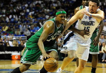 ORLANDO, FL - MAY 14:  Paul Pierce #34 of the Boston Celtics drives past Hedo Turkoglu #15 of the Orlando Magic in Game Six of the Eastern Conference Semifinals during the 2009 NBA Playoffs at Amway Arena on May 14, 2009 in Orlando, Florida.  NOTE TO USER: User expressly acknowledges and agrees that, by downloading and/or using this Photograph, user is consenting to the terms and conditions of the Getty Images License Agreement.  (Photo by Sam Greenwood/Getty Images)