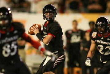 MIAMI - JANUARY 01: Tony Pike #15 of the Cincinnati Bearcats looks down field to pass against the Virginia Tech Hokies during the FedEx Orange Bowl at Dolphin Stadium on January 1, 2009 in Miami, Florida.  (Photo by Marc Serota/Getty Images)