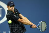 NEW YORK - AUGUST 31:   Andy Roddick returns a shot against  Bjorn Phau of Germany during day one of the 2009 U.S. Open at the USTA Billie Jean King National Tennis Center on August 31, 2009 in Flushing neighborhood of the Queens borough of New York City.  (Photo by Al Bello/Getty Images)