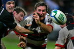GLASGOW, UNITED KINGDOM - JANUARY 18: Sam Pinder of Glasgow Warriors tackles Glen Jackson of Saracens during the Heineken Cup match at Firhill Stadium January 18, 2007 in Glasgow , Scotland.  (Photo by Jeff J Mitchell/Getty Images)