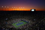 NEW YORK - SEPTEMBER 01: The sunsets over Arthur Ashe Stadium as Maria Sharapova of Russia takes on Tsvetana Pironkova of Bulgaria during day two of the 2009 U.S. Open at the USTA Billie Jean King National Tennis Center on September 1, 2009 in Flushing neighborhood of the Queens borough of New York City.  (Photo by Julian Finney/Getty Images)