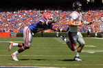 GAINESVILLE, FL - SEPTEMBER 27:  Quarterback Jevan Snead #4 of the Ole Miss Rebels runs for a touchdown against Brnadon Hicks #40 of the Florida Gators during the game at Ben Hill Griffin Stadium on September 27, 2008 in Gainesville, Florida.  (Photo by Sam Greenwood/Getty Images)